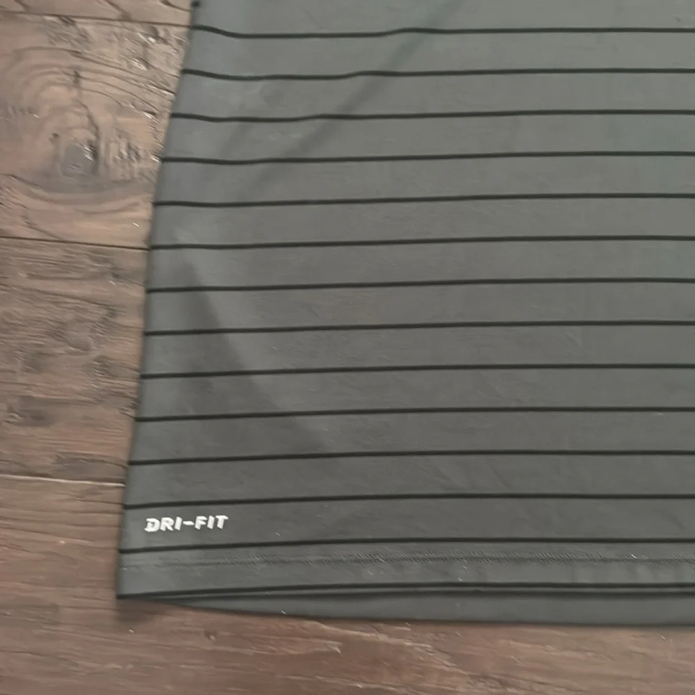 Nike Men's Black Polo with Subtle Stripes